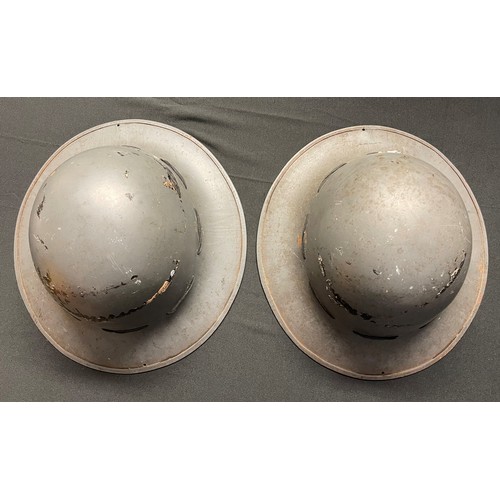 111 - WW2 British Home Front Firewatchers Steel Helmets x 2. Both with original grey paint and complete wi... 