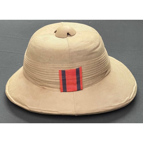 112 - WW2 British pith helmet complete with liner, brown leather chinstrap and Royal Engineers Corps colou... 