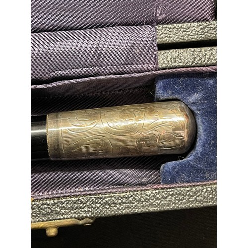 116 - A cased British Army conductor's baton, silver mounted, inscribed 