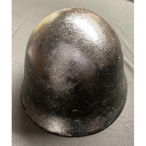 133 - WW2 Imperial Japanese Naval Landing Forces Steel Helmet. No liner or chinstrap. Repainted black.