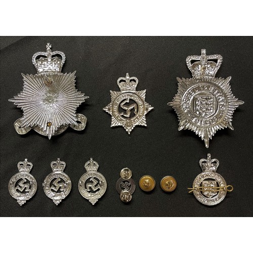 198 - Queens Crown Isle of Man Police Force Helmet Plate, cap badges, collar dogs and buttons  and Queens ... 