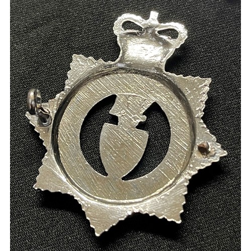 199 - Devon & Cornwall Constabulary collection comprising of: Queens Crown Helmet Plate: Queens Crown Cap ... 