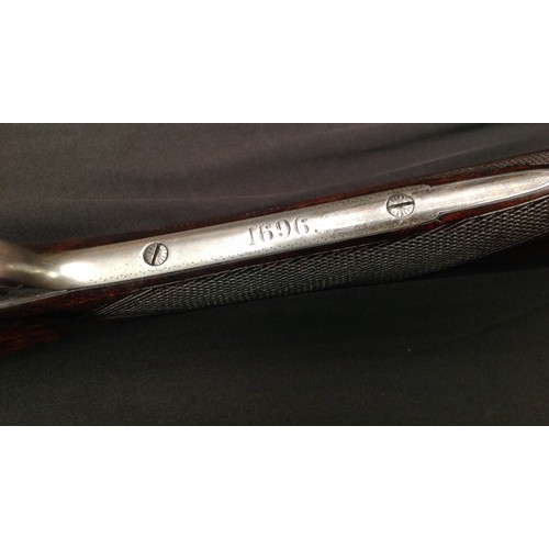 218 - Rosson 12 Bore Side by Side Shotgun Serial Number 1696. Barrel length 687mm. Overall length 110.5cm.... 