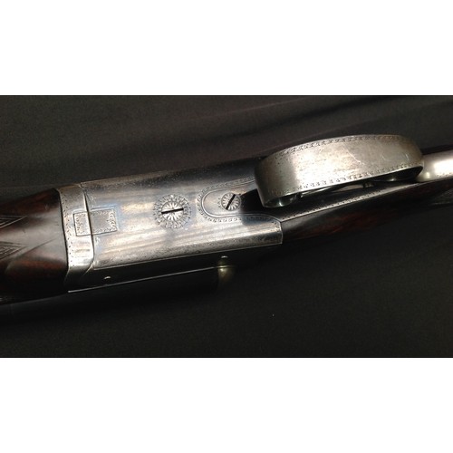 218 - Rosson 12 Bore Side by Side Shotgun Serial Number 1696. Barrel length 687mm. Overall length 110.5cm.... 