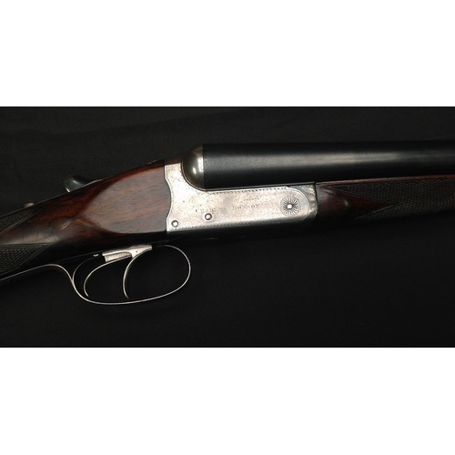 218 - Rosson 12 Bore Side by Side Shotgun Serial Number 1696. Barrel length 687mm. Overall length 110.5cm.... 