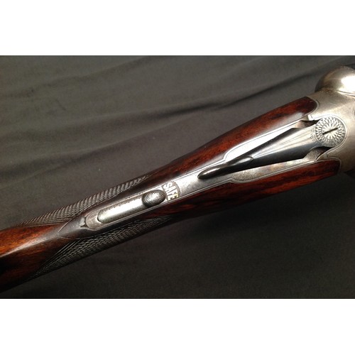 218 - Rosson 12 Bore Side by Side Shotgun Serial Number 1696. Barrel length 687mm. Overall length 110.5cm.... 