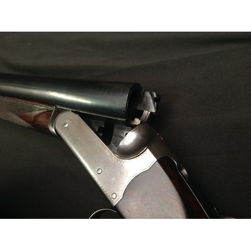 218 - Rosson 12 Bore Side by Side Shotgun Serial Number 1696. Barrel length 687mm. Overall length 110.5cm.... 