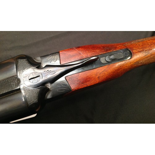 219 - Baikal 12 Bore Side by Side Shotgun Serial Number BO5886. 725mm long barrels. Overall length 114cm. ... 