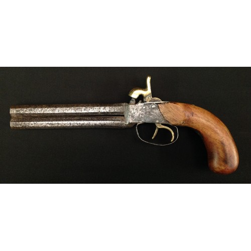 221 - A double barreled percussion cap pistol with 144mm long barrels. Bore apparox 11mm. Overall length 2... 