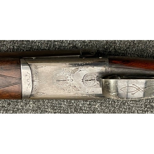 226 - Belgian made side by side 12 bore shotgun with 700mm long barrels, overall length 112.5cm. Serial nu... 