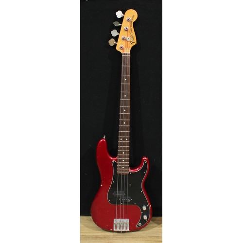 5669 - A Fender Precision Bass guitar, made in Mexico, numbered MX13337247, candy apple finish, 116cm long,... 