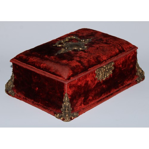 5075 - A Baroque Revival gilt-metal mounted claret plush velvet jewel casket, the slightly domed hinged cov... 