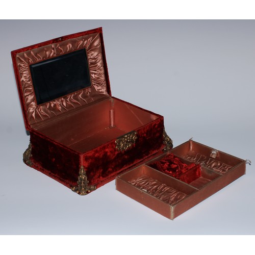 5075 - A Baroque Revival gilt-metal mounted claret plush velvet jewel casket, the slightly domed hinged cov... 