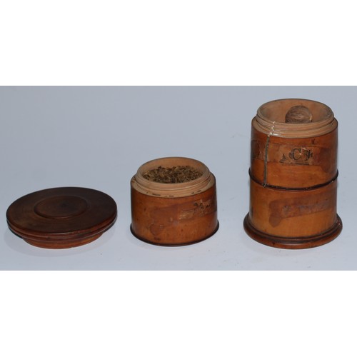 5154 - A George III toleware domed circular spice box, the hinged cover restrained by a clasp and revealing... 