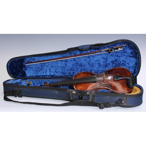 5663 - A 19th century violin, 35.6cm two-piece back excluding button, outlined with tramline purfling, carv... 