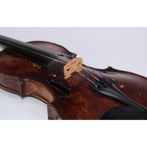 5663 - A 19th century violin, 35.6cm two-piece back excluding button, outlined with tramline purfling, carv... 