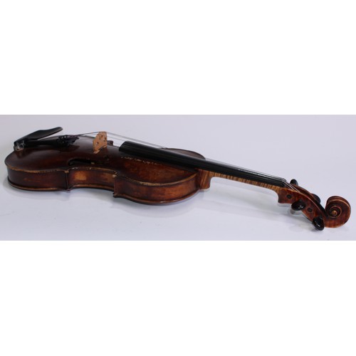 5663 - A 19th century violin, 35.6cm two-piece back excluding button, outlined with tramline purfling, carv... 