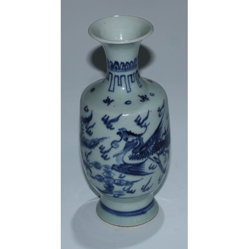 5173 - A Japanese porcelain inverted baluster vase, well-painted with a profusions of chrysanthemums and fl... 