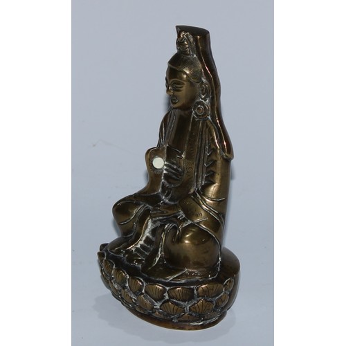 5098 - A Chinese bronze Buddha, seated in meditation, upon a lotus, wearing robes, 15cm high