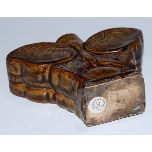 5114 - A Chinese monochrome tea caddy, as a butterfly, moulded and glazed in tones of mottled brown, 13.5cm... 