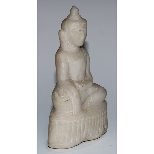 5089 - A Burmese marble Buddha, seated in Bhumisparsha mudra, lotus base, 16.5cm high