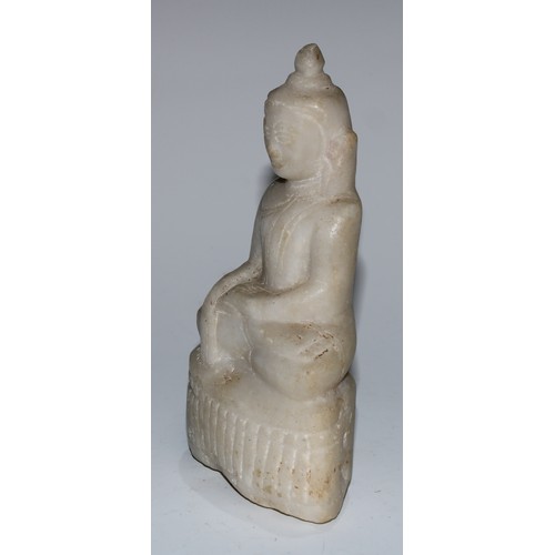 5089 - A Burmese marble Buddha, seated in Bhumisparsha mudra, lotus base, 16.5cm high