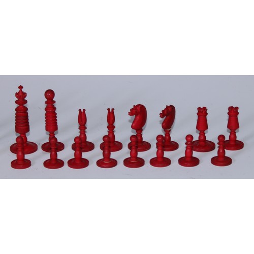 5006 - A 19th century bone Barleycorn pattern chess set, red stained opposition, the Kings 6cm high; an ony... 