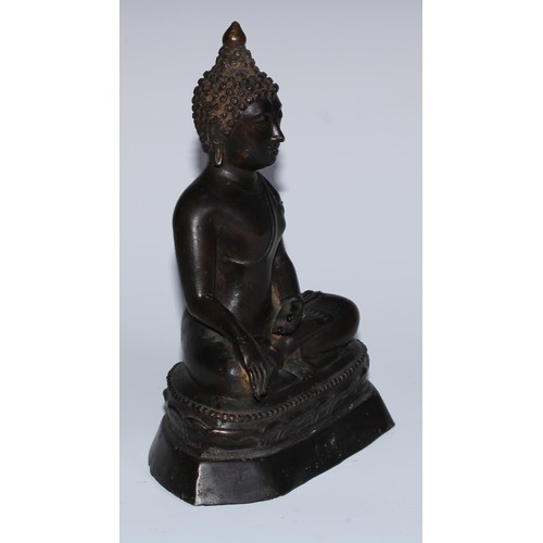 5088 - A Burmese bronze Buddha, seated in meditation, 20.5cm high