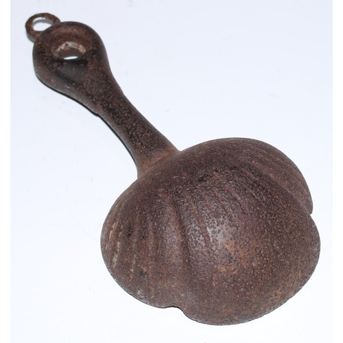 5093 - A cast iron water scoop, shell bowl, 21.5cm long