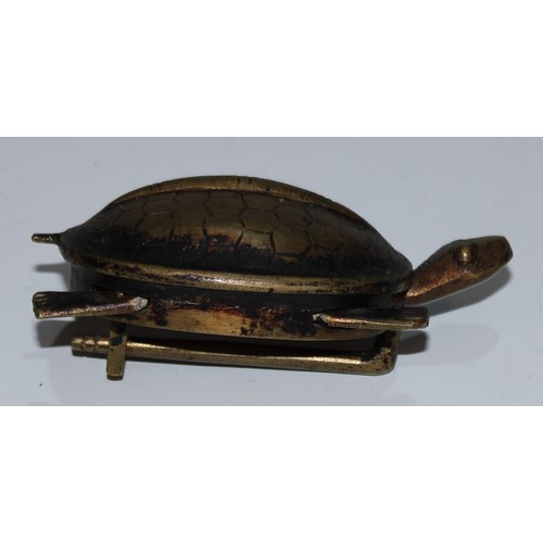 5099 - A Chinese bronze lock, cast as a turtle, 8cm long; a  zoomorphic belt hook, inlaid with roundels and... 