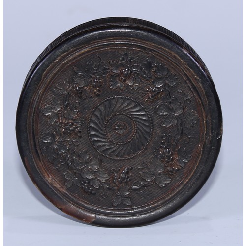 5062 - A 19th century pressed horn circular snuff box, by Wilson of Sheffield, the push-fitting cover in re... 