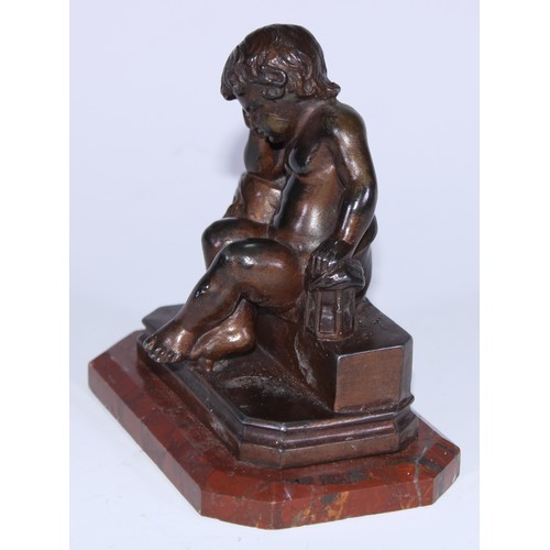 5030 - A 19th century French desk momento mori sculpture, cast as a putto contemplating a skull, canted rec... 