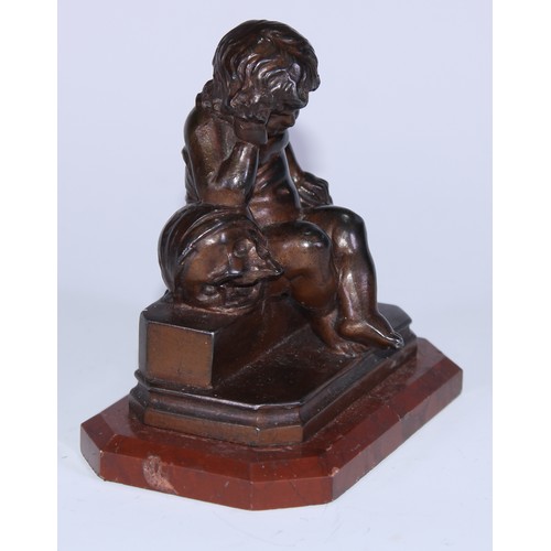 5030 - A 19th century French desk momento mori sculpture, cast as a putto contemplating a skull, canted rec... 