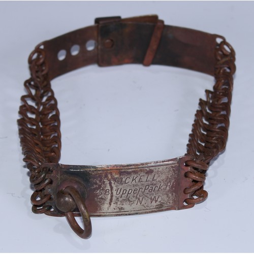 5067 - A 19th century steel dog collar, inscribed Tickell, 58 Upper Park Rd NW [London], 17cm diam