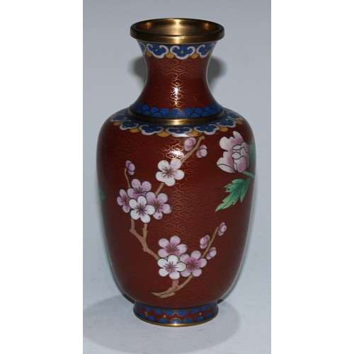 5105 - A Chinese cloisonne enamel ovoid vase, decorated in polychrome with birds and flowering branches, on... 