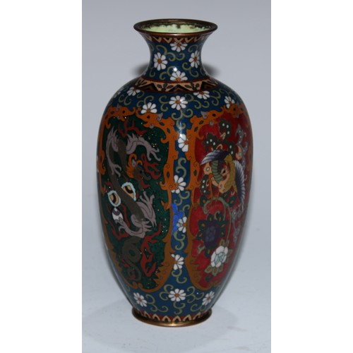 5106 - A Chinese cloisonne enamel square vase, decorated in polychrome with lotus, chrysanthemums, peonies ... 