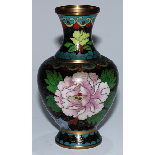 5107 - A Chinese cloisonne zun shaped vase, decorated in polychrome with a bird and blossoming prunus, on a... 