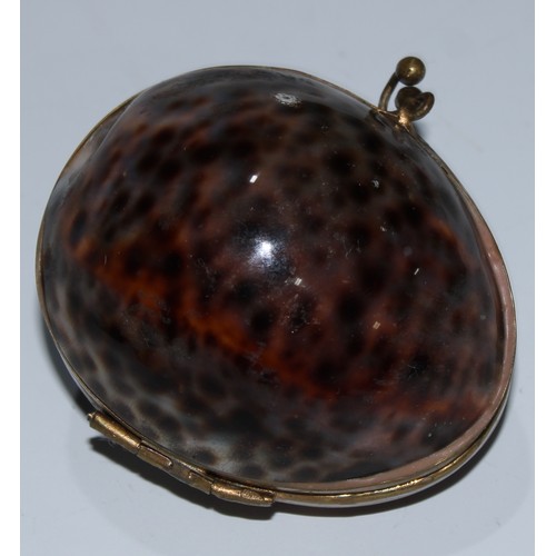 5066 - A 19th century cowrie shell purse, 6cm wide; another; a gilt metal bracelet (3)