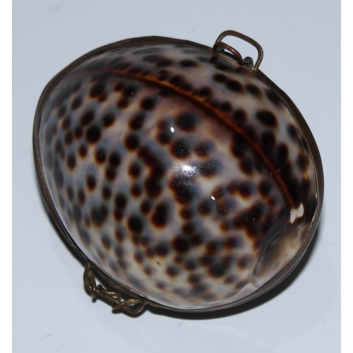 5066 - A 19th century cowrie shell purse, 6cm wide; another; a gilt metal bracelet (3)