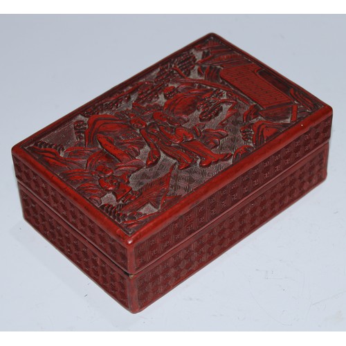 5101 - A Chinese cinnabar lacquer rectangular box and cover, carved in relief with figures beside a pagoda,... 