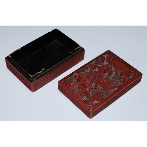 5101 - A Chinese cinnabar lacquer rectangular box and cover, carved in relief with figures beside a pagoda,... 