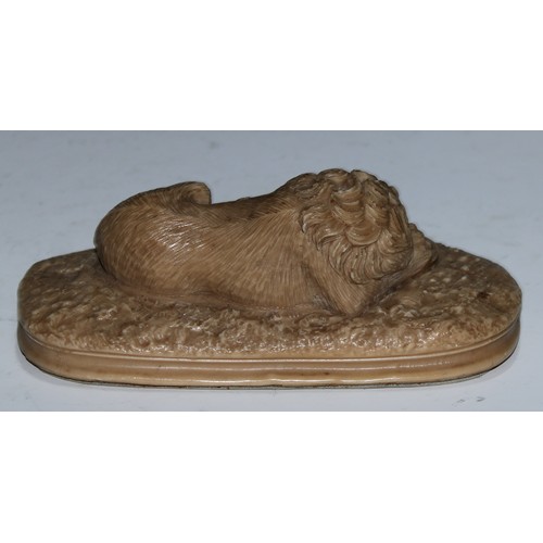 5162 - A Grand Tour lava or sulphur library model, carved as the Lion of Lucerne, oval base, 15.5cm wide