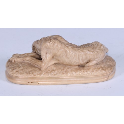 5161 - A Grand Tour lava or sulphur library model, carved as a greyhound, rounded base, 15.5cm wide, 19th c... 