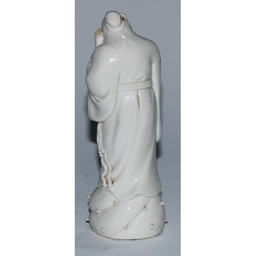 5097 - A Chinese blanc de chine figure, of an immortal holding a scroll, 14.5cm high