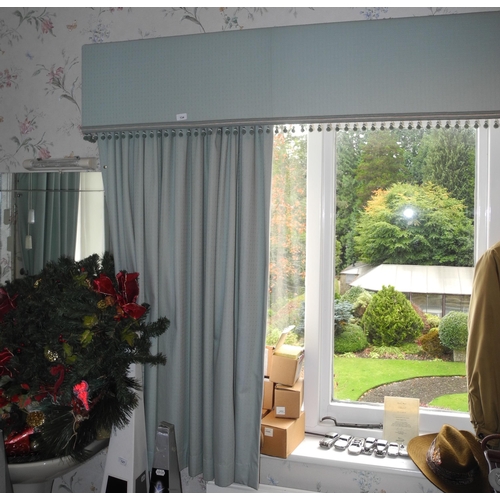 134 - A pair of  light green curtains and pelmet;  another pair smaller