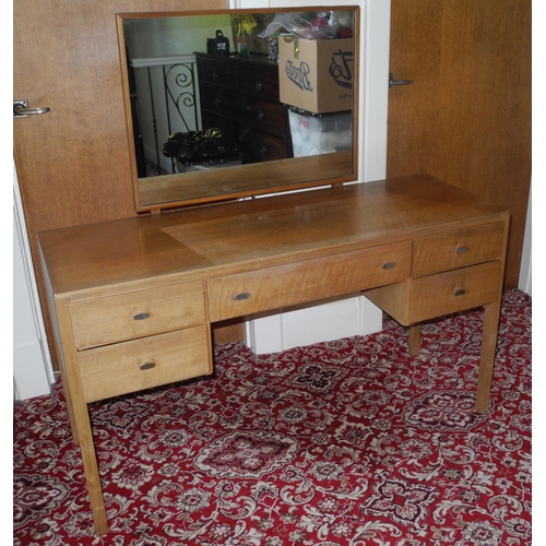 142 - A mid 20th century teak dressing table