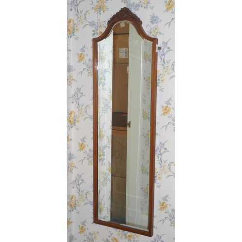 162 - An arched rectangular mirror, shell cresting, c.1950