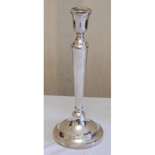 173 - A silver table candlestick, bell shaped sconce, tapering cylindrical column,  30cm high, David Shaw ... 