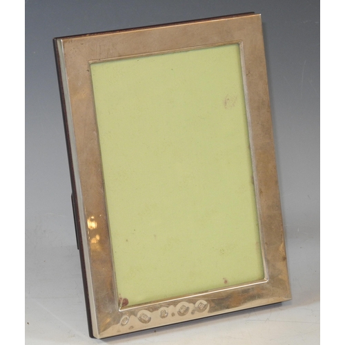 314 - A silver rectangular photograph frame, quite plain, oversized hallmarks, 18cm high, Mappin & Webb, S... 