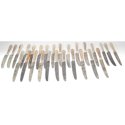 315 - A composed set of sixteen silver hafted Old English pattern knives, various dates and makers includi... 